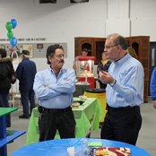 Construction Manage Roger Calvert and Executive Director Lavon Welty enjoy a snack midway through the Grand Opening.
